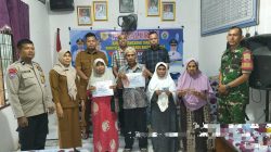 30 Keluarga di Desa Bangai Terima BLT Tahap I 2026, Bhabinkamtibmas Pastikan Penyaluran Berjalan Aman.